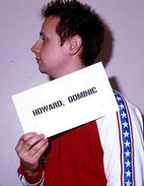 File:Dominic Howard holding sign.jpg