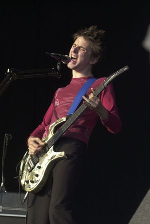 Matt singing on stage at Glastonbury
