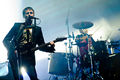 Teignmouth 2009-09-05 - Matthew Bellamy with Manson 007 and Dominic Howard.jpg
